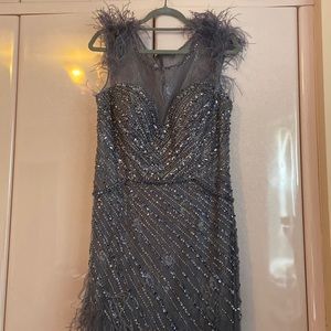 Jovani feather fringed cap sleeve gown beaded